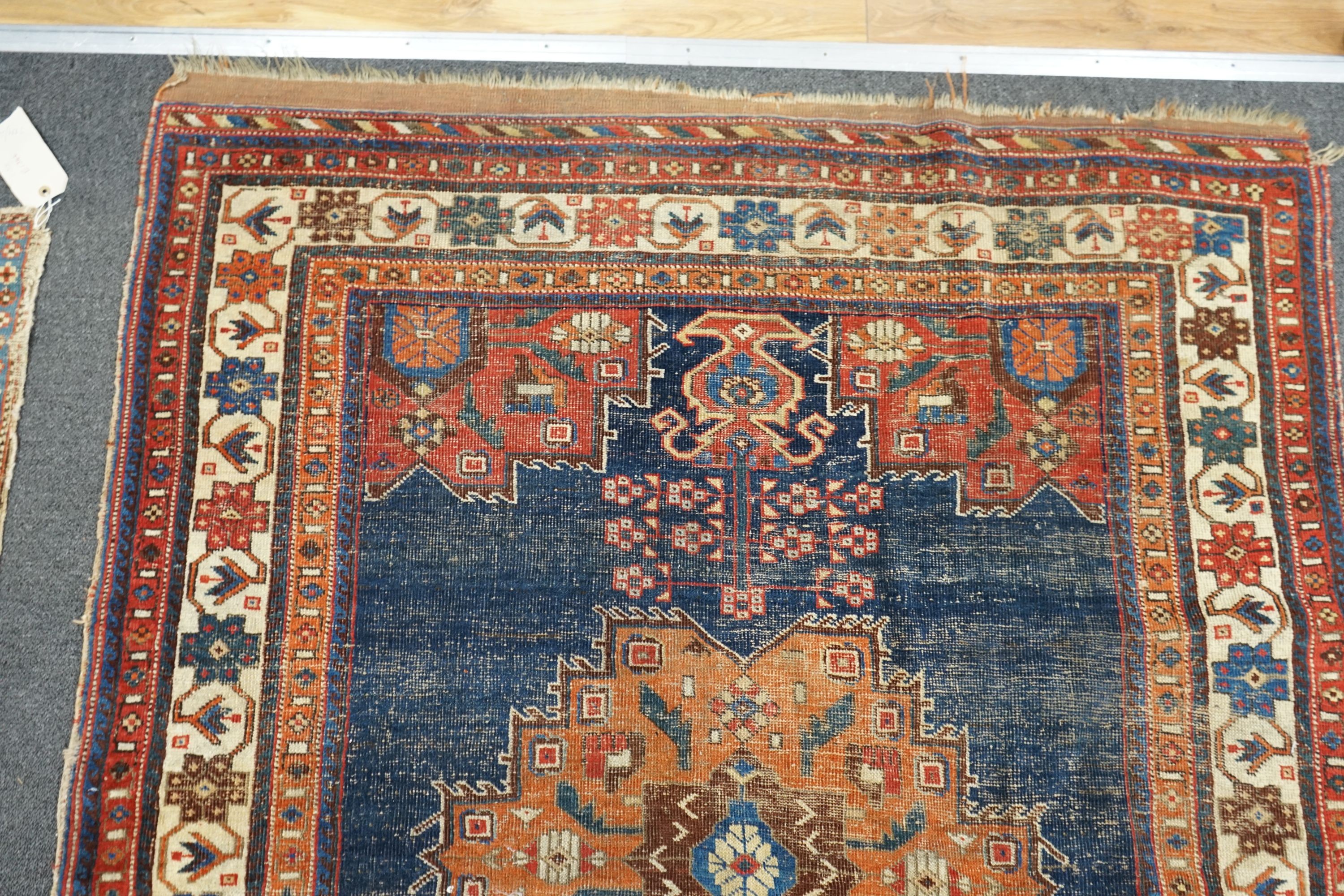 An antique Afshar blue ground rug, 180 x 130cm
